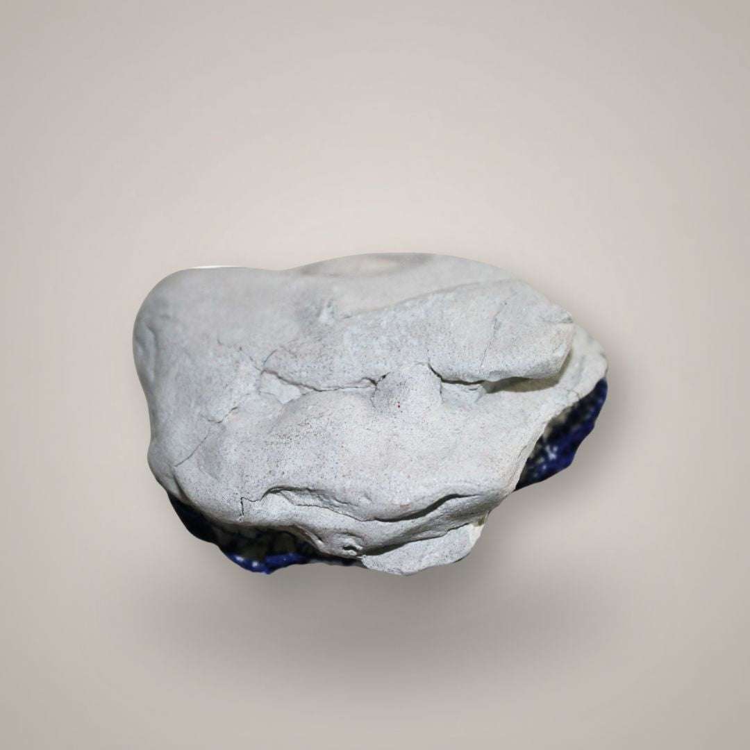 Back view of Azurite Sun pair showing natural pale matrix and blue azurite edges from Australia.
