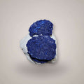 Rare Azurite Sun pair from Malbunka Copper Mine, Australia, showing two gemmy deep blue radial azurite suns.