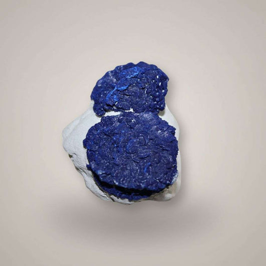 Rare Azurite Sun pair from Malbunka Copper Mine, Australia, showing two gemmy deep blue radial azurite suns.
