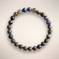 Blue Kyanite Beaded Bracelet with 6mm polished stones on an elastic stand