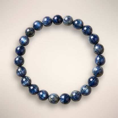 Blue Kyanite Beaded Bracelet with 8mm polished stones on an elastic stand