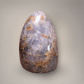 Standing Blue Rose Quartz freeform with tapered top, smoky lavender coloration, and natural internal veils.