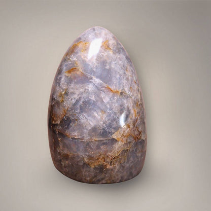 Standing Blue Rose Quartz freeform with tapered top, smoky lavender coloration, and natural internal veils.