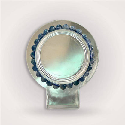 Blue Fluorite Beaded Bracelet 7mm displayed on a circular stand, showcasing polished blue beads for mental clarity and focus.
