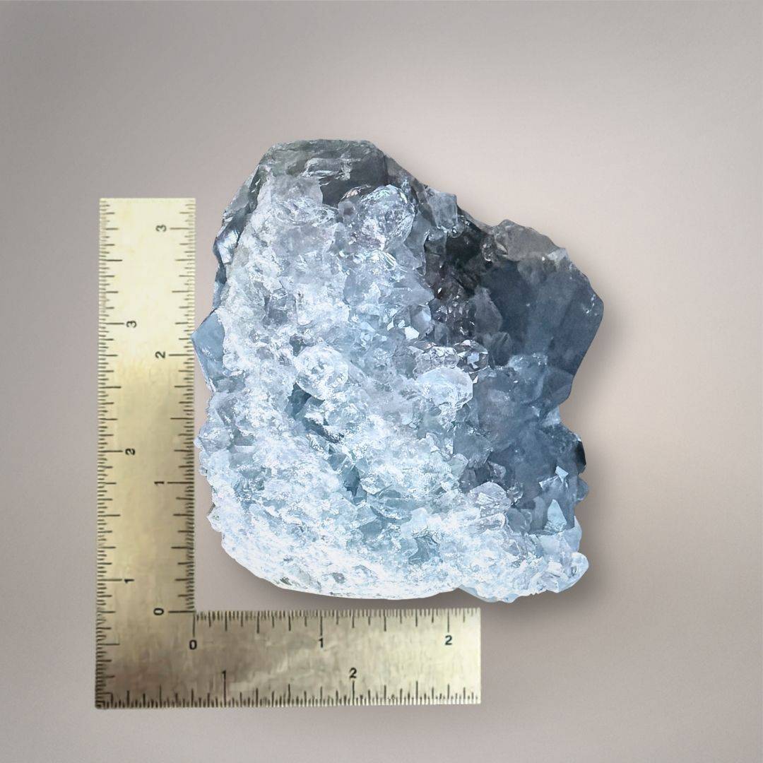 Sky blue Celestine geode cluster with sparkling crystals, irregular shape, approximately 3 inches tall, ideal for calming and clarity
