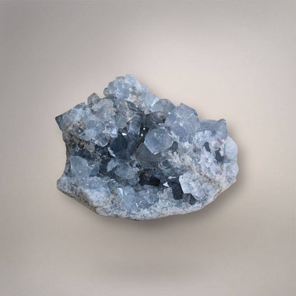 Celestine geode cluster on neutral background