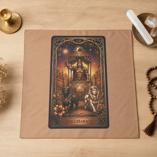 Tarot ritual cloth 'The Chariot' on a wooden surface with mystical items.