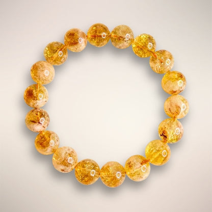 12mm Brazilian Citrine beads showcasing natural inclusions and golden clarity