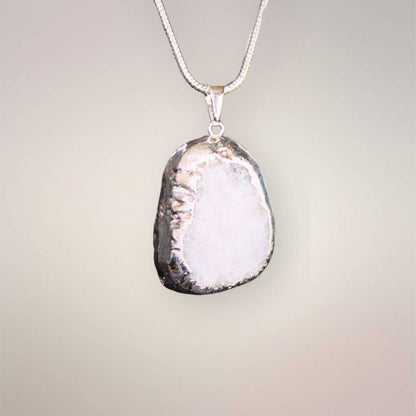 Citrine drusy pendant back showing smoothed quartz and host rock with .925 silver foil bezel and bale