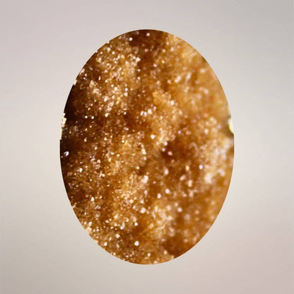 Macro view of sparkling golden citrine drusy crystal surface 