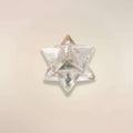 Single Clear Quartz Merkaba stone from Brazil showing the carved sacred geometry shape.