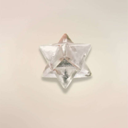 Single Clear Quartz Merkaba stone from Brazil showing the carved sacred geometry shape.
