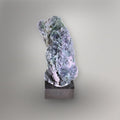 Front view of 259g Grape Agate cluster from West Sulawesi with pale lavender quartz, moss-green areas, and a tall sculptural form