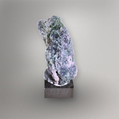 Front view of 259g Grape Agate cluster from West Sulawesi with pale lavender quartz, moss-green areas, and a tall sculptural form