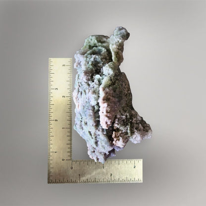 259g Grape Agate specimen beside a ruler showing its approximately 4.2-inch vertical form