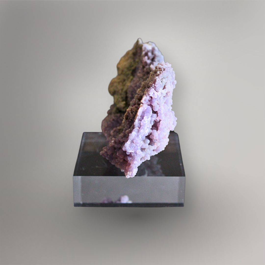 Opposite side of 374g Grape Agate cluster showing a deep cavity lined with pale lavender quartz spheres