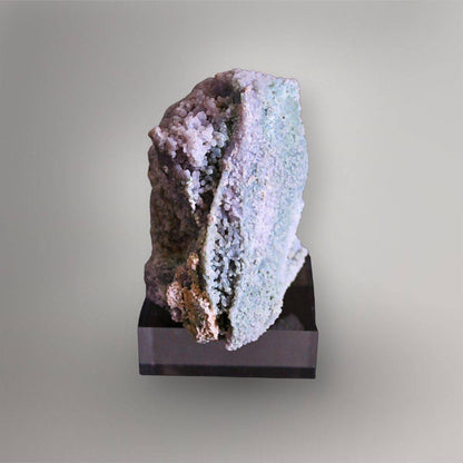 Opposite side of 437g Grape Agate cluster showing an icy blue-green quartz surface, lavender growth, and natural pocket walls