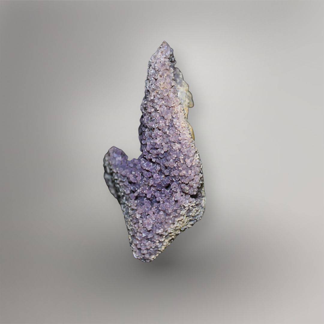 Opposite side of 770g Grape Agate cluster showing dense purple spheroidal quartz growth and sculptural contours