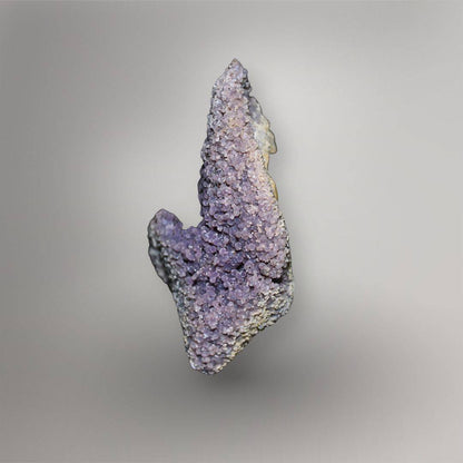 Opposite side of 770g Grape Agate cluster showing dense purple spheroidal quartz growth and sculptural contours