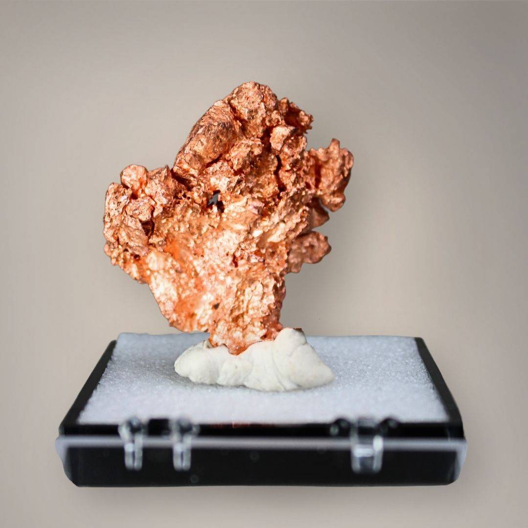 Reverse view of Chinese native copper specimen showing irregular branching projections, granular crystalline textures, and bright copper-red metallic surfaces.
