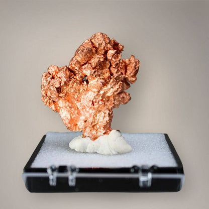 Reverse view of Chinese native copper specimen showing irregular branching projections, granular crystalline textures, and bright copper-red metallic surfaces.
