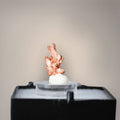 Native copper thumbnail from China featuring slender upright growth, forked crystalline projections, and bright copper-red metallic surfaces mounted on a clear acrylic riser.