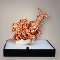 Front view of native copper from China showing interconnected copper-red metallic growth, irregular crystalline projections, and an elevated forked branch.