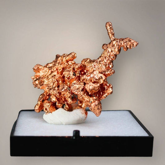 Front view of native copper from China showing interconnected copper-red metallic growth, irregular crystalline projections, and an elevated forked branch.