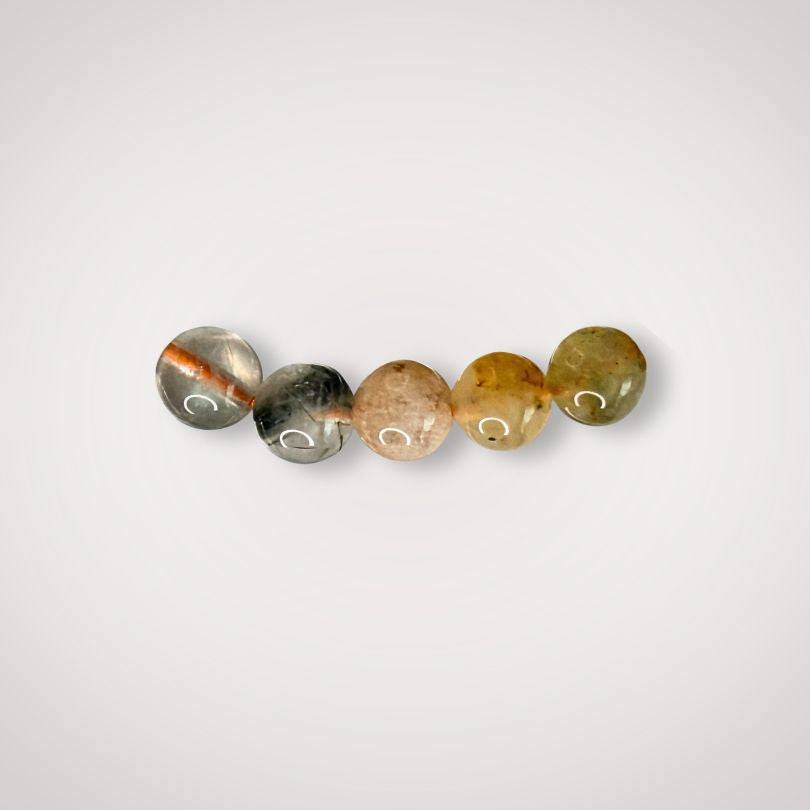 Close-up of five 6mm Mixed Rutile Quartz beads with visible rutile inclusions in varied earthy hues, highlighting natural clarity and flow properties.