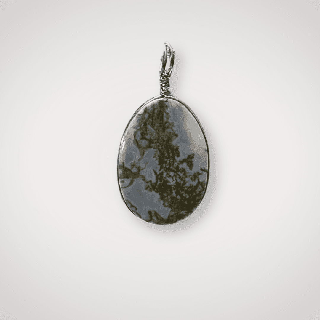 Close-up of Indonesian Blue Opal pendant with silver wire wrap