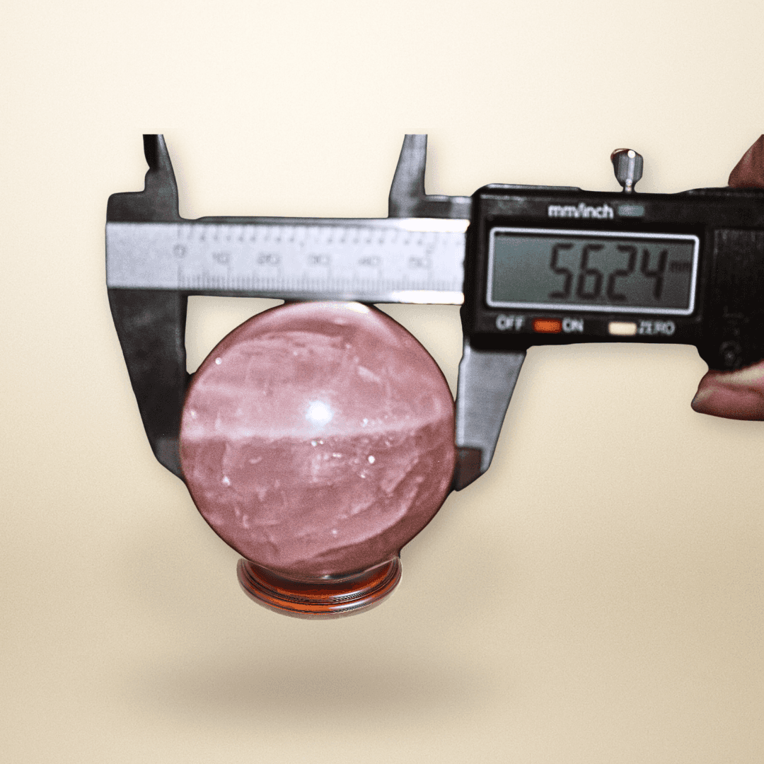Measuring Rose Quartz sphere 55mm for size and display