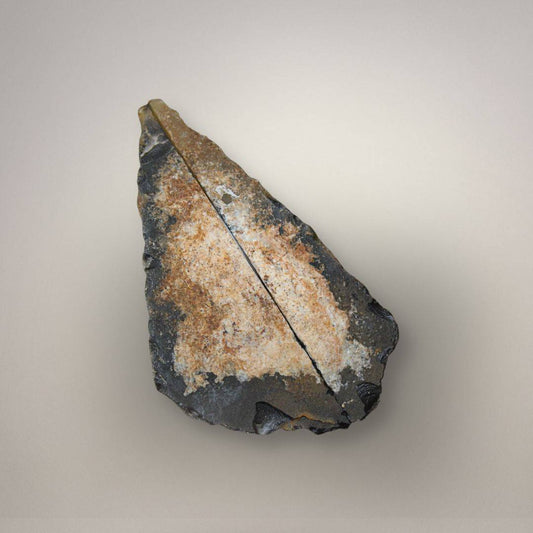 Angular polyhedral agate nodule showing triangular flat-sided geometry
