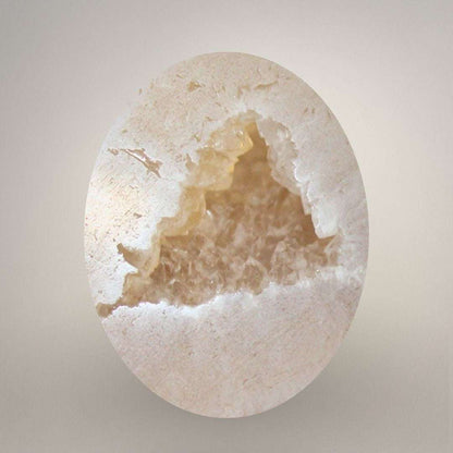 Macro view of quartz geode pocket within polyhedral agate