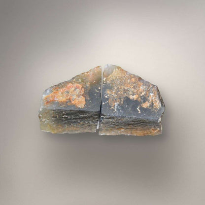 Small polyhedral agate nodule showing angular flat-sided structure and translucent edges