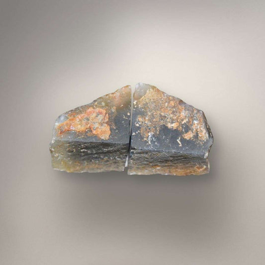 Small polyhedral agate nodule showing angular flat-sided structure and translucent edges