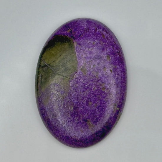 Mystic Parcel video showcase of AA grade Atlantisite 45ct oval cabochon with purple and green mix