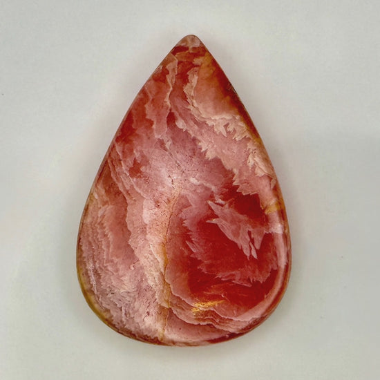 Tear drop shaped Rhodochrosite cabochon, 70ct polished pink gemstone from India