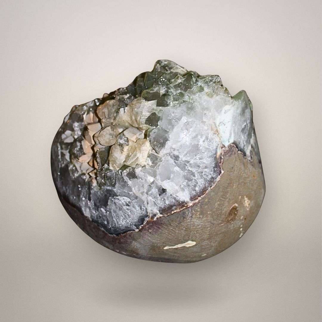 Back view of Brazilian quartz geode showing natural rind and chalcedony structure