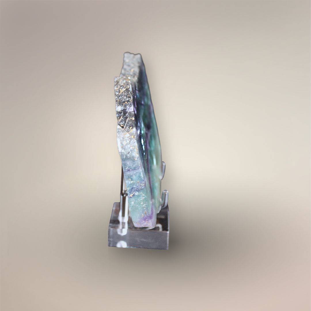 Side view of 12 mm thick Rainbow Fluorite slab with polished faces and raw natural edge