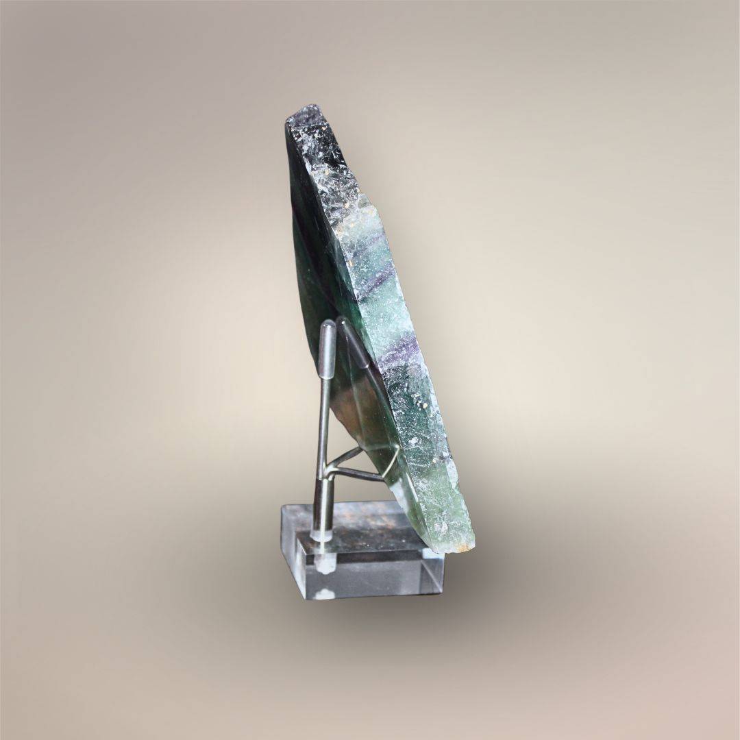 Side view of 12 mm thick Rainbow Fluorite slab with polished faces and raw natural edge