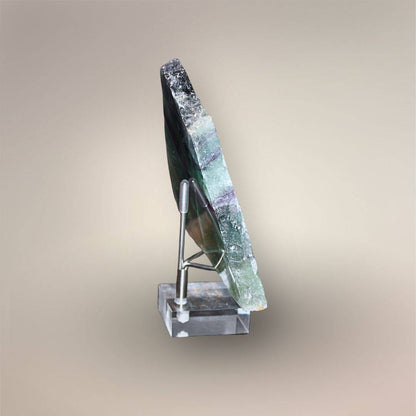 Side view of 12 mm thick Rainbow Fluorite slab with polished faces and raw natural edge