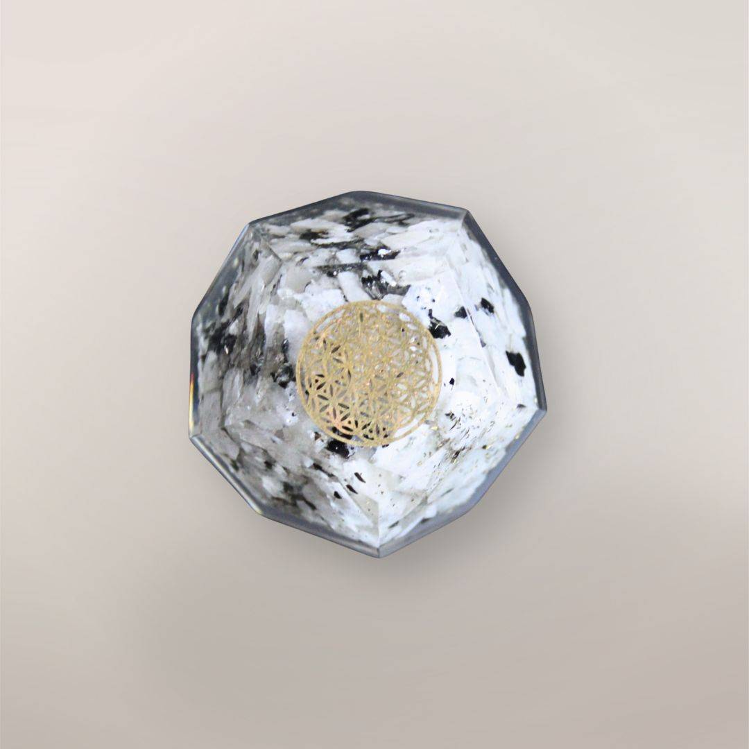 Rainbow Moonstone orgonite dodecahedron with Indian Rainbow Moonstone chips, golden Flower of Life symbol, metallic flakes, and faceted resin shape