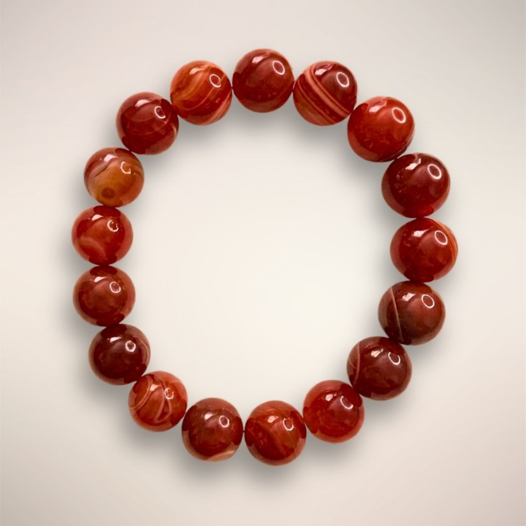 Red Botswana Agate 12mm Beaded Bracelet featuring polished round stones