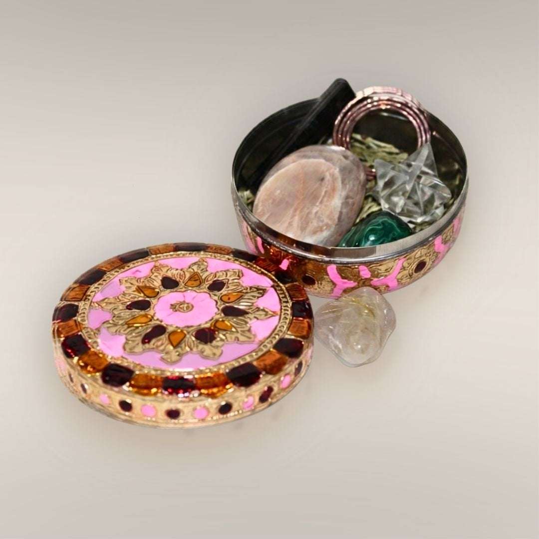 Open Safe Travels Ritual Box with lid beside it, showing Black Tourmaline, Peach Moonstone, Clear Quartz Merkabah, Malachite, copper spiral, and cedar inside