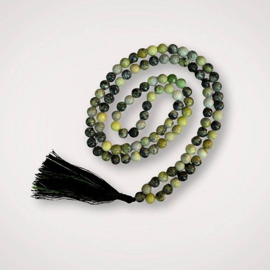 Serpentine Mala with 108 polished 8mm beads in green and black tones, featuring a black tassel for grounding and renewal meditation practices.