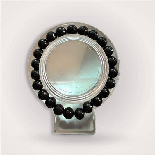 Shungite Beaded Bracelet 8mm displayed in a circular arrangement on a clear stand, showcasing its glossy black beads for grounding and protection.