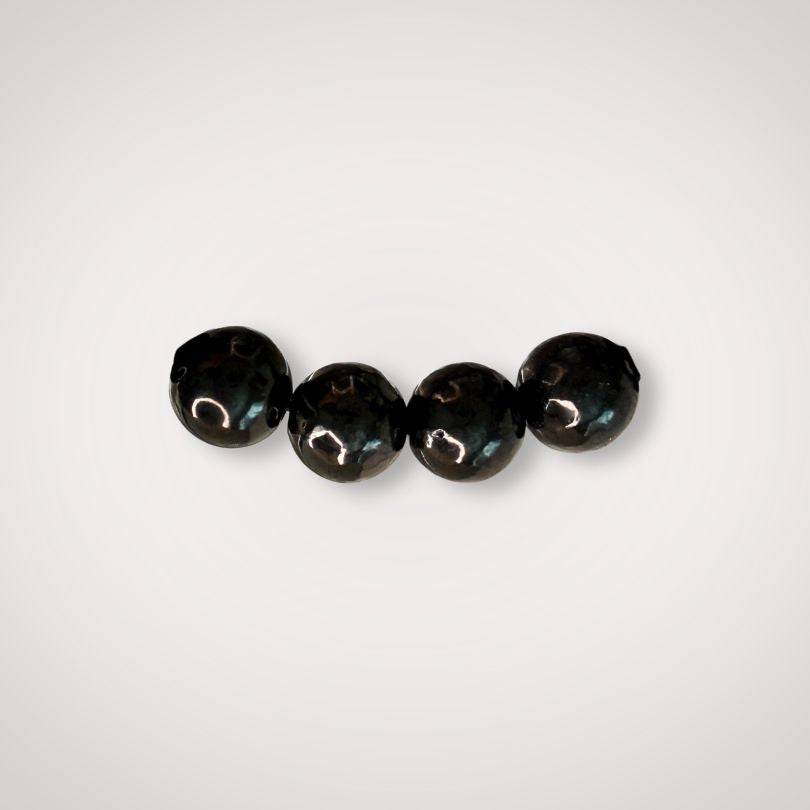 Close-up of four 8mm Shungite beads with a polished finish, ideal for energy clearing and grounding in jewelry making or healing accessories.