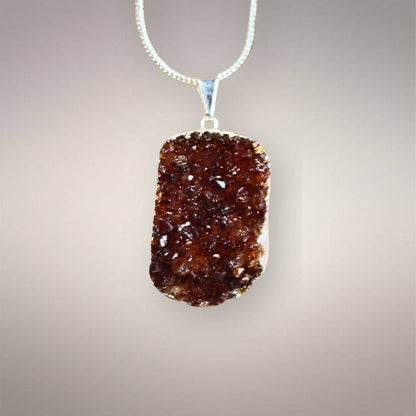 Smoky citrine cluster pendant with deep golden-brown crystal face and .925 silver bale
