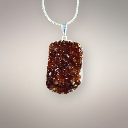 Smoky citrine cluster pendant with deep golden-brown crystal face and .925 silver bale