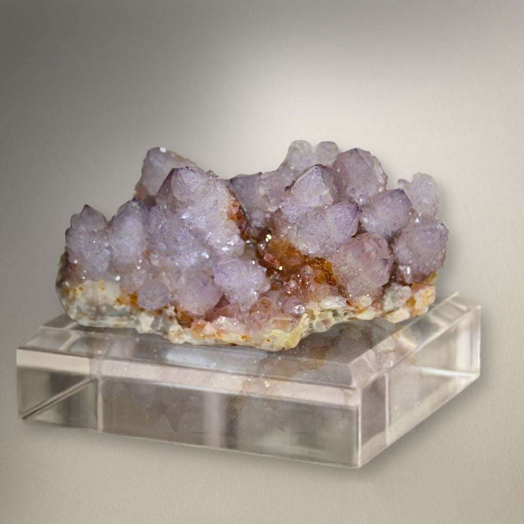 Amethyst Spirit Quartz cluster from Boekenhouthoek, South Africa with soft lavender points and sparkling cactus quartz texture.